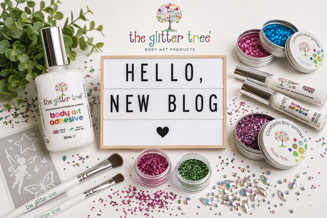 Hello New Blog announcement flat lay with The Glitter Tree body art adhesive, biodegradable glitter and stencils